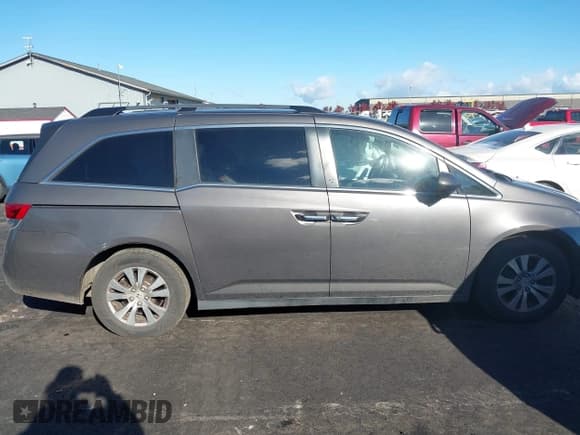 ✅ 2014 Honda Odyssey EX-L • VIN: 5FNRL5H60EB031424 • Лот: 43621706. Опубликован ранее на IAAI с пробегом 152 005 миль. Бесплатный доступ к архиву аукционных продаж из США и подробный отчёт об истории автомобиля на DreamBid. Изображение 13.