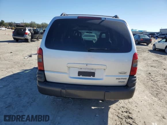✅ 2002 Pontiac Montana 1SX • VIN: 1GMDV03E72D193880 • Lot: 42328975. Wystawiony na Copart z przebiegiem 86 980 mil. Bezpłatny archiwum sprzedaży aukcyjnych z USA i szczegółowy raport historii pojazdu na DreamBid. Zdjęcie 6.