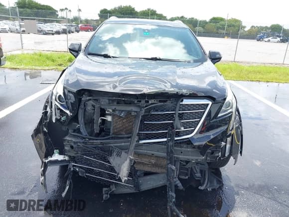 ✅ 2017 Cadillac XT5 FWD • VIN: 1GYKNARS8HZ204017 • Лот: 42476119. Опубликован ранее на IAAI с пробегом 120 290 миль. Бесплатный доступ к архиву аукционных продаж из США и подробный отчёт об истории автомобиля на DreamBid. Изображение 13.