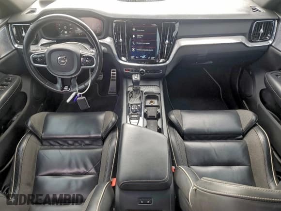 ✅ 2019 Volvo S60 R-Design • VIN: 7JRA22TM7KG002736 • Лот: 94300005. Опубликован ранее на Copart с пробегом 179 556 миль. Бесплатный доступ к архиву аукционных продаж из США и подробный отчёт об истории автомобиля на DreamBid. Изображение 8.