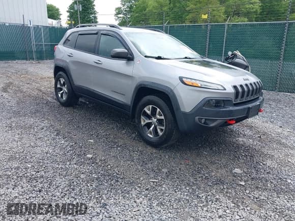 ✅ 2017 Jeep Cherokee Trailhawk • VIN: 1C4PJMBB9HW517257 • Лот: 42243019. Опубликован ранее на IAAI с пробегом 103 183 миль. Бесплатный доступ к архиву аукционных продаж из США и подробный отчёт об истории автомобиля на DreamBid. Изображение 1.