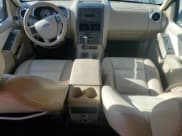 ✅ 2007 Ford Explorer Sport Trac Limited • VIN: 1FMEU53827UB06215 • Лот: 91043015. Опубликован ранее на Copart с пробегом 143 567 миль. Бесплатный доступ к архиву аукционных продаж из США и подробный отчёт об истории автомобиля на DreamBid. Изображение 8.