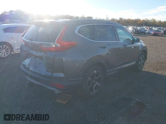 ✅ 2017 Honda CR-V Touring • VIN: 2HKRW2H97HH612456 • Lot: 43560410. Listed on IAAI with 120,652 mi. Free auction sales archive from the USA and detailed vehicle history report at DreamBid. Image 4.