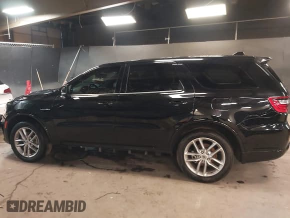 ✅ 2022 Dodge Durango R/T • VIN: 1C4SDHCT2NC224281 • Lot: 41232204. Listed on IAAI with 50,748 mi. Free auction sales archive from the USA and detailed vehicle history report at DreamBid. Image 14.