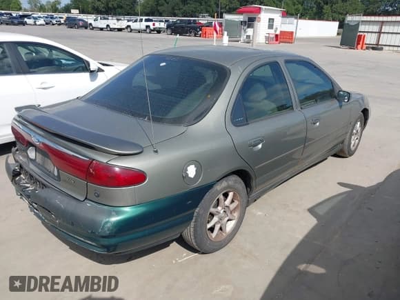 ✅ 1999 Ford Contour LX • VIN: 1FAFP66L9XK201636 • Лот: 42808815. Опубликован ранее на IAAI с пробегом 121 359 миль. Бесплатный доступ к архиву аукционных продаж из США и подробный отчёт об истории автомобиля на DreamBid. Изображение 4.