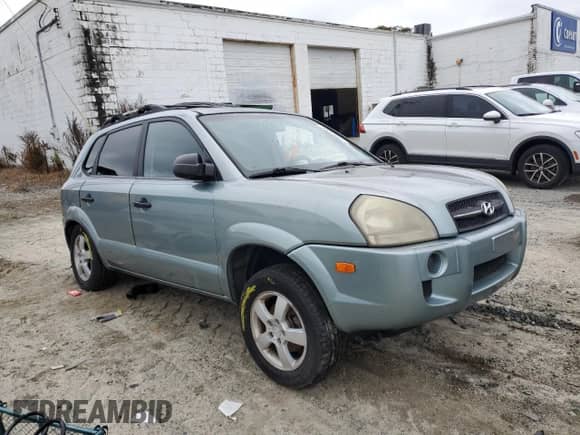 2005 Hyundai Tucson GL z VIN KM8JM12B65U184708, wystawiony jako Copart lot #73351044 z przebiegiem 209 563 mil mil oraz Szkoda całkowita • Salvage title. Historia ofert i sprzedaży dostępna na DreamBid. Obrazek 4.