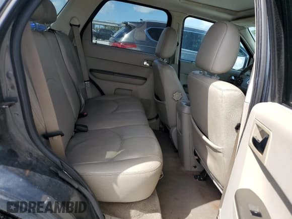 ✅ 2008 Mercury Mariner Premier • VIN: 4M2CU87128KJ48773 • Лот: 85306715. Опубликован ранее на Copart с пробегом 180 388 миль. Бесплатный доступ к архиву аукционных продаж из США и подробный отчёт об истории автомобиля на DreamBid. Изображение 11.