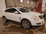 ✅ 2012 Cadillac SRX Premium Collection • VIN: 3GYFNCE39CS561384 • Lot: 96707565. Wystawiony na Copart z przebiegiem 180 316 mil. Bezpłatny archiwum sprzedaży aukcyjnych z USA i szczegółowy raport historii pojazdu na DreamBid. Zdjęcie 4.