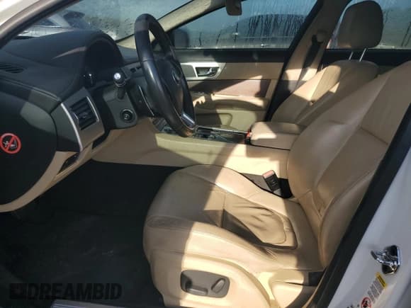 ✅ 2014 Jaguar XF T • VIN: SAJWA0ES0EPU30628 • Lot: 80831375. Listed on Copart with 128,057 mi. Free auction sales archive from the USA and detailed vehicle history report at DreamBid. Image 7.