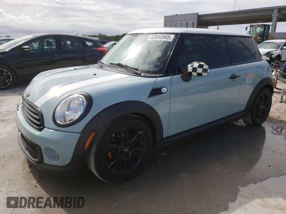 2012 MINI Hardtop with VIN WMWSU3C52CT367682, listed as a Copart auction lot 63045965 with 124,683 mi miles and Salvage title. Bid and sale history available at DreamBid. Image 1.