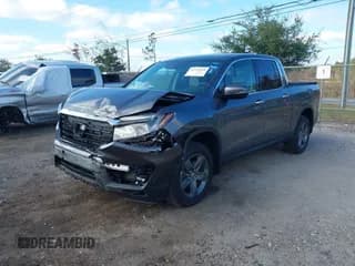 ✅ 2023 Honda Ridgeline RTL-E • VIN: 5FPYK3F77PB032661 • Лот: 43732830. Опубликован ранее на IAAI с пробегом 25 693 миль. Бесплатный доступ к архиву аукционных продаж из США и подробный отчёт об истории автомобиля на DreamBid. Изображение 2.