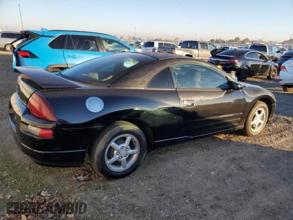 ✅ 2002 Mitsubishi Eclipse RS • VIN: 4A3AC34G52E104748 • Лот: 83438794. Опубликован ранее на Copart с пробегом 111 306 миль. Бесплатный доступ к архиву аукционных продаж из США и подробный отчёт об истории автомобиля на DreamBid. Изображение 3.