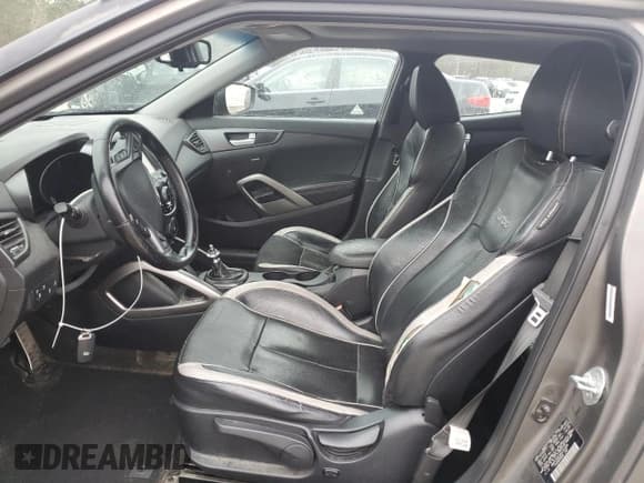 ✅ 2014 Hyundai Veloster Turbo • VIN: KMHTC6AE3EU191684 • Lot: 45010365. Wystawiony na Copart z przebiegiem 176 773 mil. Bezpłatny archiwum sprzedaży aukcyjnych z USA i szczegółowy raport historii pojazdu na DreamBid. Zdjęcie 7.