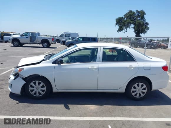 ✅ 2010 Toyota Corolla • VIN: JTDBU4EE8A9115063 • Lot: 42366910. Listed on IAAI with 169,997 mi. Free auction sales archive from the USA and detailed vehicle history report at DreamBid. Image 14.