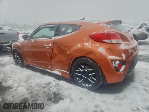 ✅ 2014 Hyundai Veloster Turbo • VIN: KMHTC6AEXEU205791 • Lot: 94635375. Listed on Copart with 107,471 mi. Free auction sales archive from the USA and detailed vehicle history report at DreamBid. Image 2.