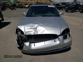 2001 Hyundai Sonata GLS с VIN KMHWF35V81A392523, выставлен на аукционе Copart как лот 74584334 с пробегом 174 597 миль миль и Списание • Salvage title. История ставок и продаж доступна на DreamBid. Изображение 5.