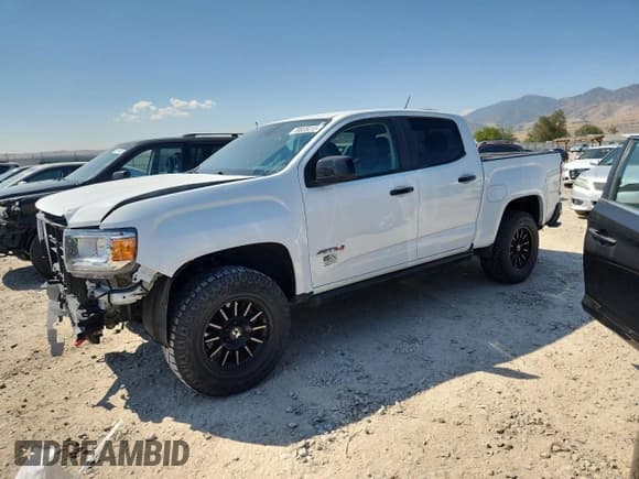✅ 2021 GMC Canyon 4WD AT4 • VIN: 1GTG6FEN1M1281259 • Lot: 70835415. Wystawiony na Copart z przebiegiem 82 067 mil. Bezpłatny archiwum sprzedaży aukcyjnych z USA i szczegółowy raport historii pojazdu na DreamBid. Zdjęcie 1.