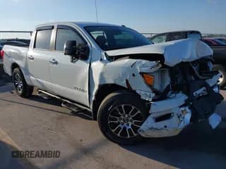 ✅ 2021 Nissan Titan SV • VIN: 1N6AA1EF8MN506539 • Lot: 43720616. Listed on IAAI with 21,204 mi. Free auction sales archive from the USA and detailed vehicle history report at DreamBid. Image 1.