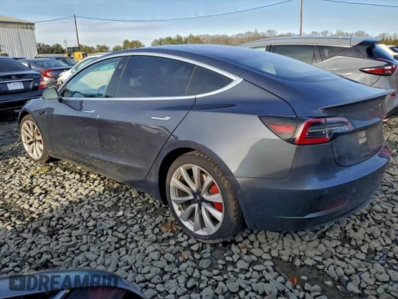 ✅ 2018 Tesla Model 3 Long Range Battery • VIN: 5YJ3E1EB1JF171227 • Lot: 94741835. Listed on Copart with 115,263 mi. Free auction sales archive from the USA and detailed vehicle history report at DreamBid. Image 2.