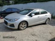 ✅ 2019 Chevrolet Cruze LS • VIN: 1G1BC5SM2K7151731 • Lot: 61159983. Listed on Copart with 102,978 mi. Free auction sales archive from the USA and detailed vehicle history report at DreamBid. Image 1.