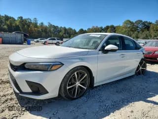 ✅ 2022 Honda Civic Touring • VIN: 2HGFE1F93NH307951 • Lot: 82345935. Wystawiony na Copart z przebiegiem 61 323 mil. Bezpłatny archiwum sprzedaży aukcyjnych z USA i szczegółowy raport historii pojazdu na DreamBid. Zdjęcie 1.