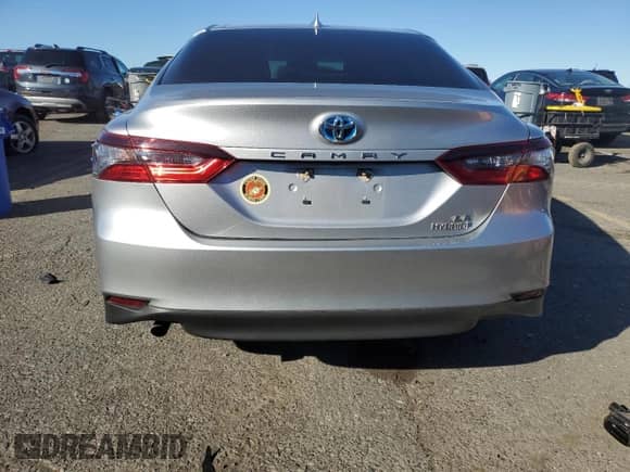 2021 Toyota Camry Hybrid LE with VIN 4T1C31AK3MU551351, listed as a Copart auction lot 84996375 with 49,145 mi miles and Salvage title. Bid and sale history available at DreamBid. Image 6.