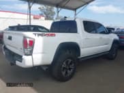 ✅ 2021 Toyota Tacoma SR • VIN: 3TMCZ5AN0MM387565 • Lot: 42300520. Listed on IAAI with 42,153 mi. Free auction sales archive from the USA and detailed vehicle history report at DreamBid. Image 4.