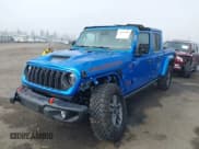 ✅ 2024 Jeep Gladiator Mojave X • VIN: 1C6JJTEG5RL121313 • Lot: 41013599. Listed on IAAI with 2,952 mi. Free auction sales archive from the USA and detailed vehicle history report at DreamBid. Image 2.