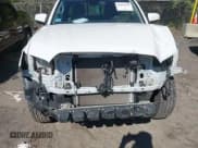 ✅ 2022 Toyota Tacoma SR • VIN: 3TYRX5GN4NT056386 • Lot: 42325120. Listed on IAAI with 57,703 mi. Free auction sales archive from the USA and detailed vehicle history report at DreamBid. Image 6.