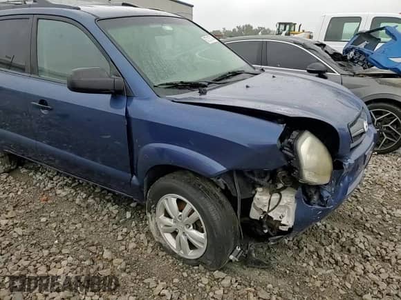 2009 Hyundai Tucson GLS z VIN KM8JM12B89U009365, wystawiony jako Copart lot #67215704 z przebiegiem 157 475 mil mil oraz Szkoda całkowita • Salvage title. Historia ofert i sprzedaży dostępna na DreamBid. Obrazek 11.