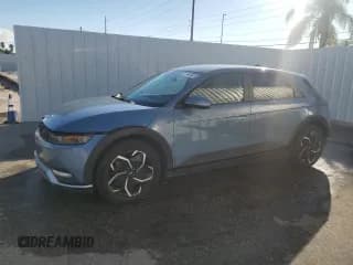 ✅ 2023 Hyundai Ioniq 5 SEL • VIN: KM8KNDAF6PU215773 • Лот: 89623875. Опубликован ранее на Copart с пробегом 26 983 миль. Бесплатный доступ к архиву аукционных продаж из США и подробный отчёт об истории автомобиля на DreamBid. Изображение 1.