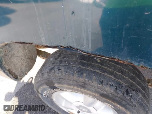 ✅ 1997 Dodge Dakota • VIN: 1B7GL23X8VS124300 • Lot: 41561541. Wystawiony na IAAI z przebiegiem 170 248 mil. Bezpłatny archiwum sprzedaży aukcyjnych z USA i szczegółowy raport historii pojazdu na DreamBid. Zdjęcie 6.