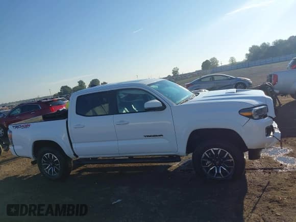 ✅ 2023 Toyota Tacoma SR • VIN: 3TMCZ5AN5PM558010 • Лот: 43358292. Опубликован ранее на IAAI с пробегом 26 117 миль. Бесплатный доступ к архиву аукционных продаж из США и подробный отчёт об истории автомобиля на DreamBid. Изображение 14.