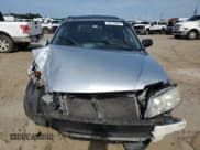 ✅ 2003 Mazda Protege • VIN: JM1BJ245831172217 • Lot: 77188184. Listed on Copart with 201,272 mi. Free auction sales archive from the USA and detailed vehicle history report at DreamBid. Image 5.