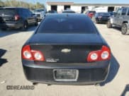 ✅ 2012 Chevrolet Malibu LTZ • VIN: 1G1ZG5E74CF146000 • Lot: 76532814. Listed on Copart with 156,469 mi. Free auction sales archive from the USA and detailed vehicle history report at DreamBid. Image 6.