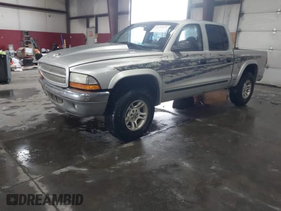 ✅ 2004 Dodge Dakota SLT • VIN: 1D7HG48N64S523528 • Lot: 41199575. Wystawiony na IAAI z przebiegiem 261 239 mil. Bezpłatny archiwum sprzedaży aukcyjnych z USA i szczegółowy raport historii pojazdu na DreamBid. Zdjęcie 2.