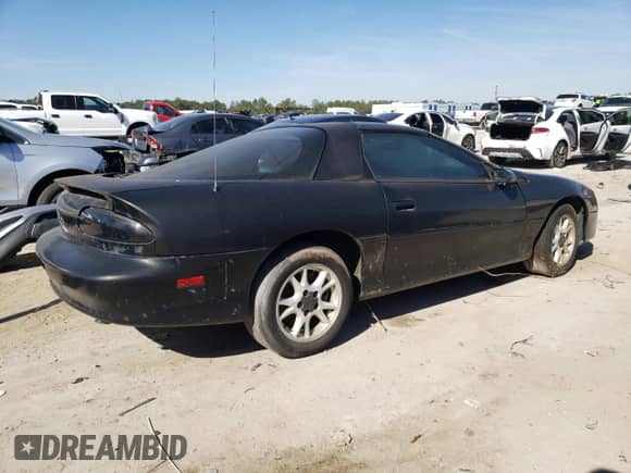 2000 Chevrolet Camaro z VIN 2G1FP22K9Y2147517, wystawiony jako Copart lot #43206745 z przebiegiem 152 416 mil mil oraz Czysty tytuł • Clean title. Historia ofert i sprzedaży dostępna na DreamBid. Obrazek 3.