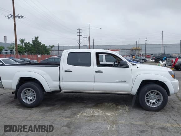 ✅ 2009 Toyota Tacoma PreRunner • VIN: 3TMKU72N49M020938 • Lot: 42422101. Listed on IAAI with 89,335 mi. Free auction sales archive from the USA and detailed vehicle history report at DreamBid. Image 13.