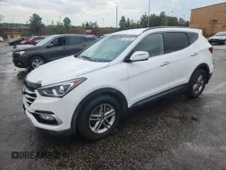 ✅ 2018 Hyundai Santa Fe 2.4L • VIN: 5NMZUDLB2JH101462 • Лот: 84201535. Опубликован ранее на Copart с пробегом 183 614 миль. Бесплатный доступ к архиву аукционных продаж из США и подробный отчёт об истории автомобиля на DreamBid. Изображение 1.
