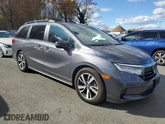 ✅ 2021 Honda Odyssey Touring • VIN: 5FNRL6H84MB030394 • Lot: 91530895. Listed on Copart with 59,049 mi. Free auction sales archive from the USA and detailed vehicle history report at DreamBid. Image 4.