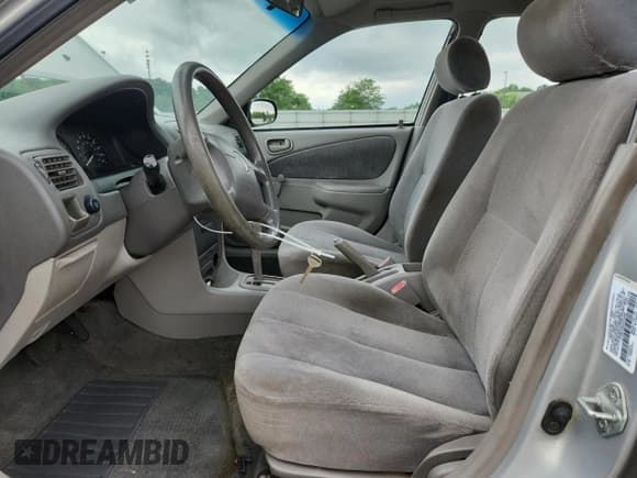 ✅ 2002 Toyota Corolla CE • VIN: 2T1BR12E02C573468 • Lot: 59622215. Listed on Copart with 226,616 mi. Free auction sales archive from the USA and detailed vehicle history report at DreamBid. Image 7.