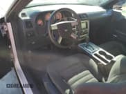 ✅ 2010 Dodge Challenger SE • VIN: 2B3CJ4DV4AH306575 • Lot: 46276145. Wystawiony na Copart z przebiegiem 154 287 mil. Bezpłatny archiwum sprzedaży aukcyjnych z USA i szczegółowy raport historii pojazdu na DreamBid. Zdjęcie 8.