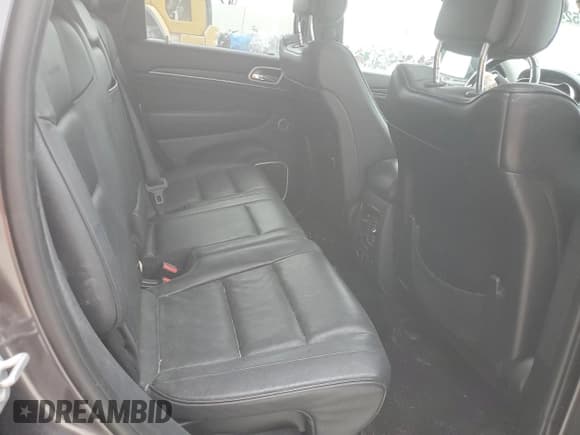 ✅ 2018 Jeep Grand Cherokee Summit • VIN: 1C4RJFJGXJC347502 • Lot: 52486975. Listed on Copart with 100,503 mi. Free auction sales archive from the USA and detailed vehicle history report at DreamBid. Image 11.