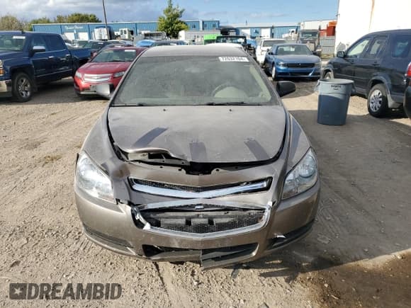 ✅ 2011 Chevrolet Malibu 1LS • VIN: 1G1ZB5E19BF318708 • Lot: 72632104. Listed on Copart with 138,549 mi. Free auction sales archive from the USA and detailed vehicle history report at DreamBid. Image 5.
