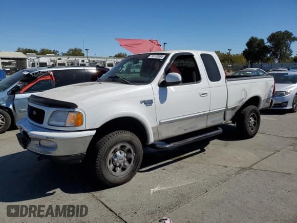 ✅ 1998 Ford F-250 • VIN: 1FTPX28L9WKB01247 • Lot: 70723084. Listed on Copart with 119,870 mi. Free auction sales archive from the USA and detailed vehicle history report at DreamBid. Image 1.