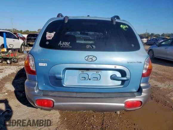 2004 Hyundai Santa Fe with VIN KM8SB12B64U826594, listed as a Copart auction lot 90612545 with 101,208 mi miles and Salvage title. Bid and sale history available at DreamBid. Image 6.
