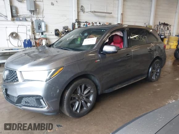 ✅ 2019 Acura MDX Technology • VIN: 5J8YD4H0XKL025557 • Lot: 42365567. Wystawiony na IAAI z przebiegiem 102 733 mil. Bezpłatny archiwum sprzedaży aukcyjnych z USA i szczegółowy raport historii pojazdu na DreamBid. Zdjęcie 2.