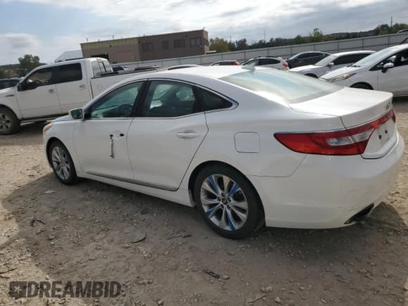 ✅ 2013 Hyundai Azera • VIN: KMHFG4JGXDA199367 • Лот: 82405005. Опубликован ранее на Copart с пробегом 215 300 миль. Бесплатный доступ к архиву аукционных продаж из США и подробный отчёт об истории автомобиля на DreamBid. Изображение 2.
