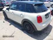 ✅ 2016 MINI Hardtop 4 Door • VIN: WMWXU1C50G2D08848 • Lot: 42215256. Listed on IAAI with 102,643 mi. Free auction sales archive from the USA and detailed vehicle history report at DreamBid. Image 3.