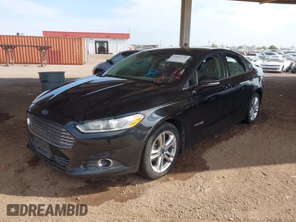 ✅ 2016 Ford Fusion SE Hybrid • VIN: 3FA6P0LU3GR127202 • Lot: 43061240. Wystawiony na IAAI z przebiegiem 196 916 mil. Bezpłatny archiwum sprzedaży aukcyjnych z USA i szczegółowy raport historii pojazdu na DreamBid. Zdjęcie 2.